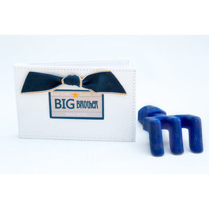 4 of 4:Big Brother Brag Book in setting with child's toy.