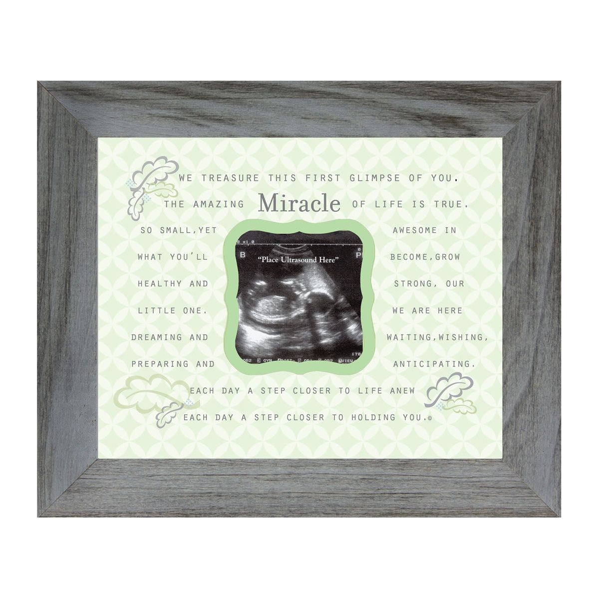 Up close view of Miracle artwork and sentiment in distressed gray frame.