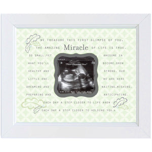 4 of 5:Up close view of Miracle artwork and sentiment in distressed white frame.
