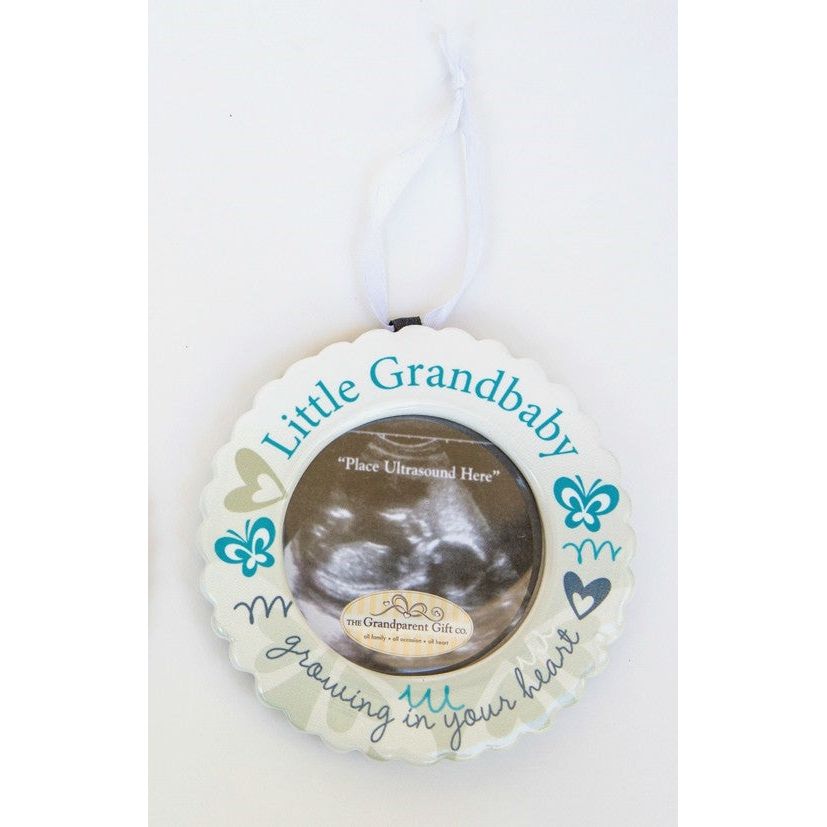 Little Grandbaby ornament with white satin ribbon for hanging.