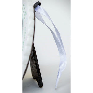 3 of 6:Side view of ornament with easel back for tables and white satin ribbon for hanging.