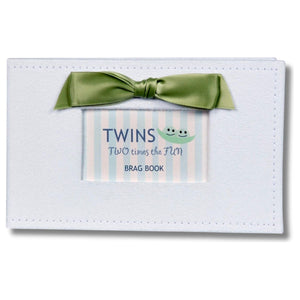 1 of 5:White faux suede photo album with green satin bow and a window with sentiment artwork showing.
