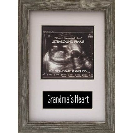 5x7 real wood farmhouse photo frame with a white mat with opening for a 3.25" square ultrasound or photo and "Grandma's Heart" sentiment.