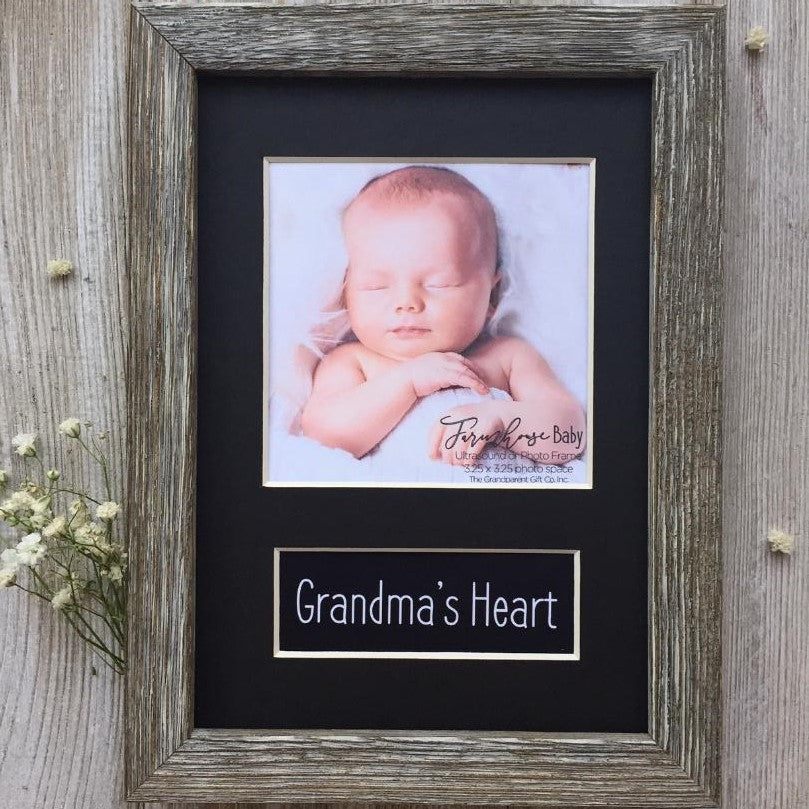 5x7 real wood farmhouse photo frame with a black mat with opening for a 3.25&quot; square ultrasound or photo and &quot;Grandma&#39;s Heart&quot; sentiment.