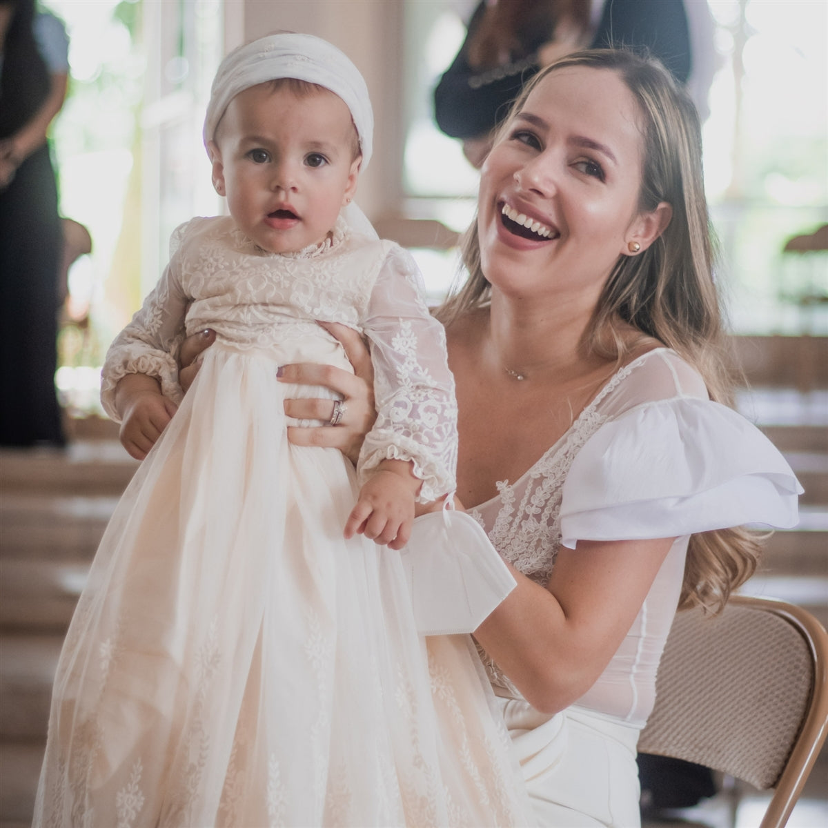 Photo of a godmother and her goddaughter.