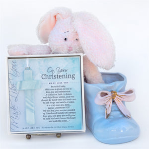 2 of 4:Christening Cross Gift in a nursery setting.