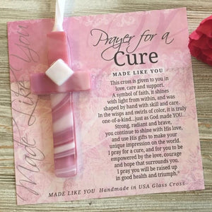2 of 4:Pink glass cross and artwork with