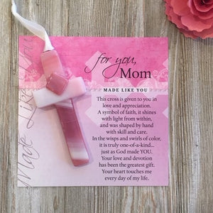 2 of 4:Pink glass cross and artwork with