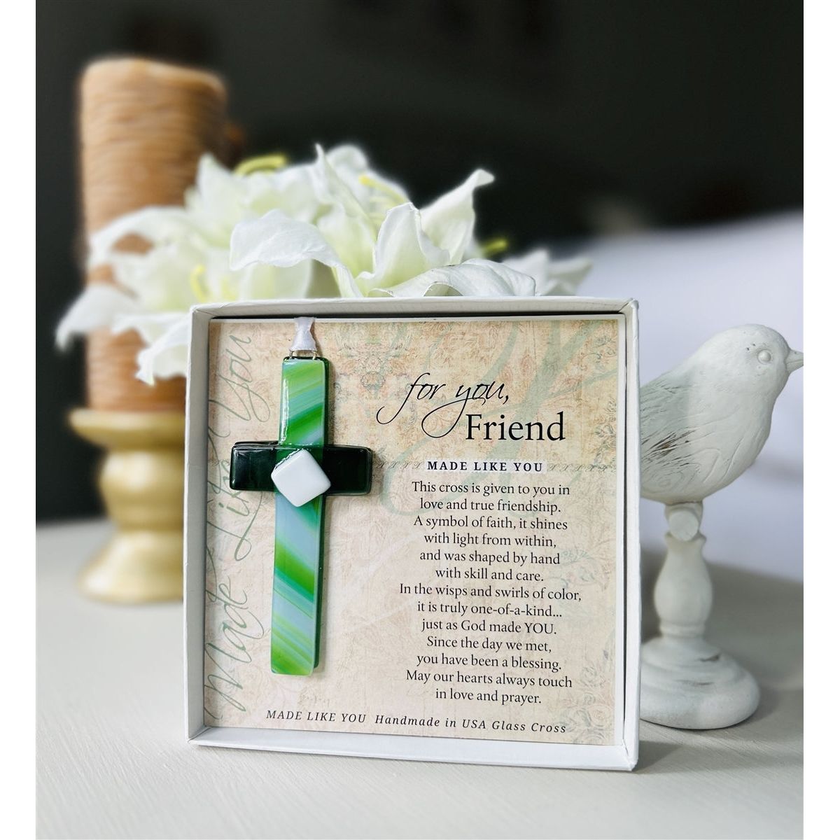 Friend cross gift on a table.