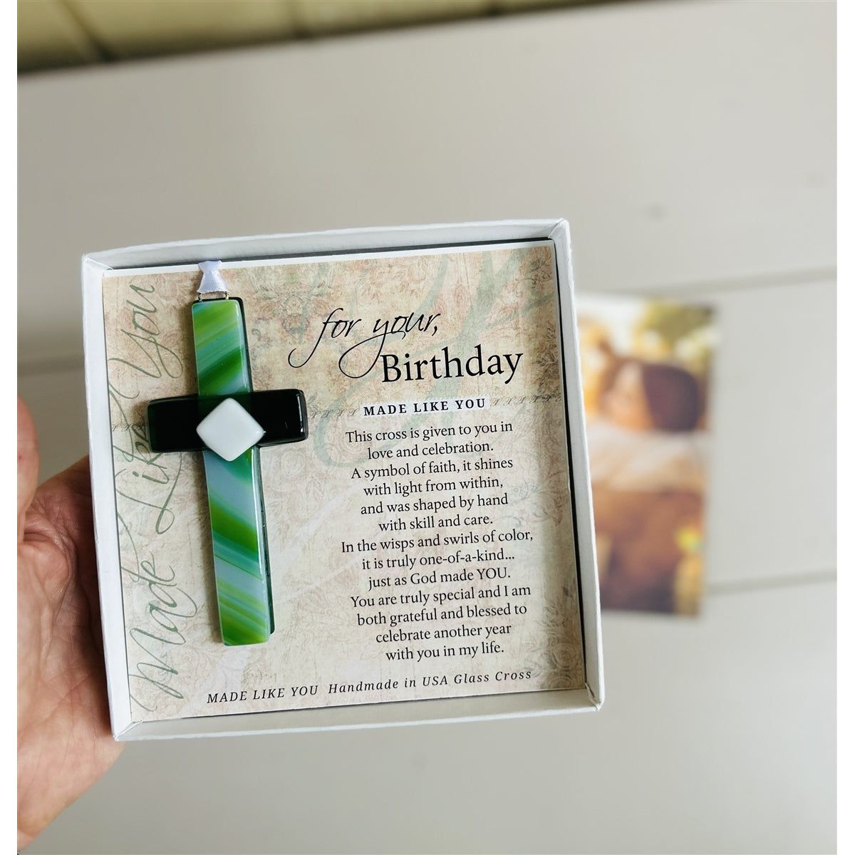 "For Your, Birthday" cross with a photo of friends hugging in background.