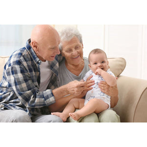 3 of 5:Grandparents with their first grandchild.