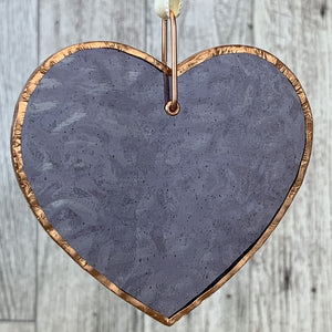 4 of 4:Translucent periwinkle heart with copper edging and off-white satin ribbon for hanging.