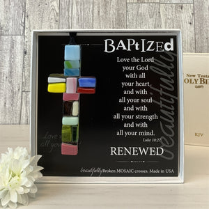 4 of 5:Baptized glass mosaic cross with bible in background.