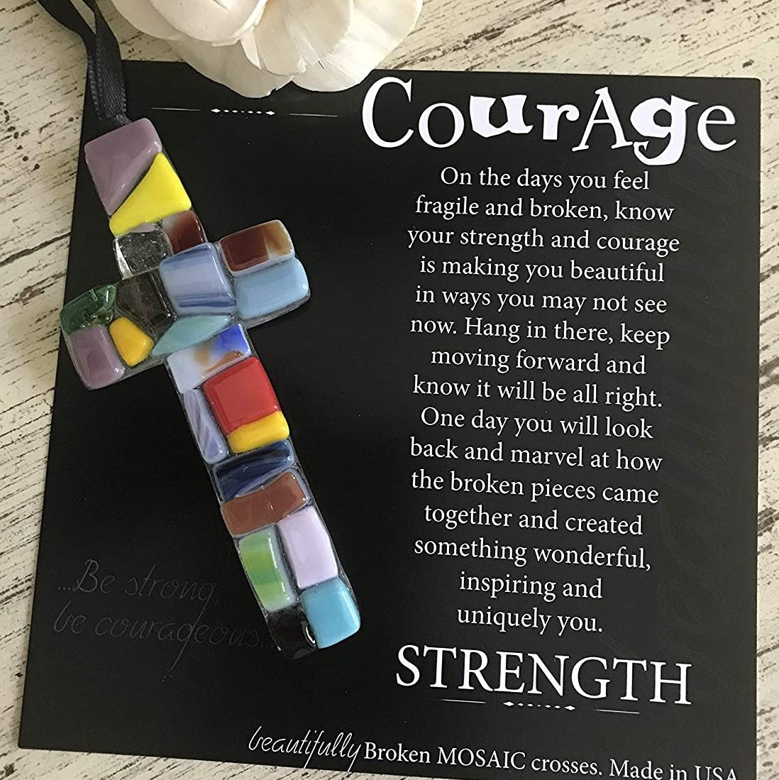 Glass mosaic cross with Courage artwork.