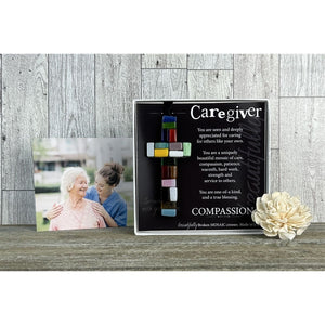 2 of 4:Caregiver Gift with a photo of a patient and cargiver in the background.