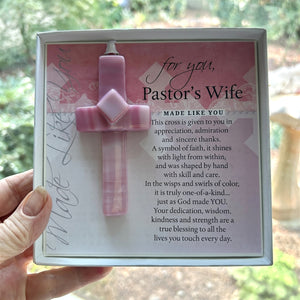 6 of 6:Pastor's Wife cross gift being held in a hand.