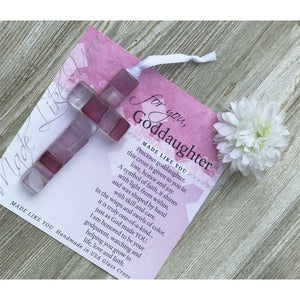 2 of 8:Pink Mosaic cross with shades of pink and clear glass lying on the For You, Goddaughter sentiment artwork.