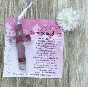 2 of 4:Pink mosaic cross with shades of pink, clear, and white lying on the