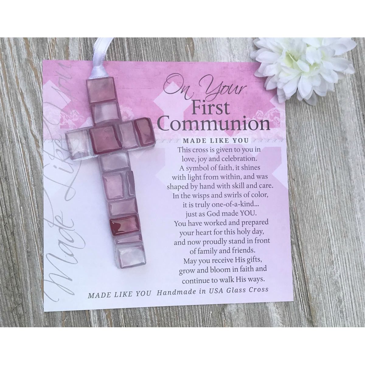 Pink Mosaic cross with shades of pink, white, and clear lying next to the &quot;On Your First Communion&quot; sentiment artwork.