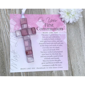 2 of 6:Pink Mosaic cross with shades of pink, white, and clear lying next to the
