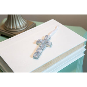 2 of 4:Gray mosaic glass cross with white satin ribbon for hanging.