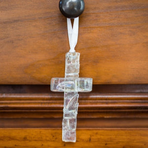 4 of 5:Clear iridescent mosaic cross hanging from a knob.