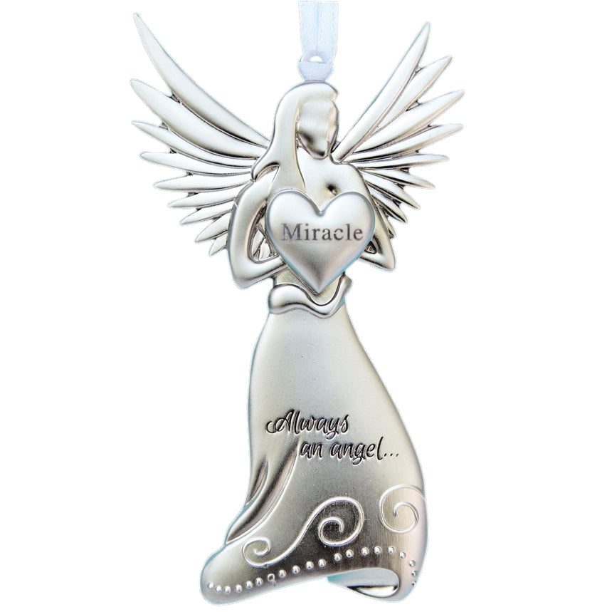 Silver toned metal angel holding a heart with the word "Miracle" and "Always an angel..." engraved in the skirt.
