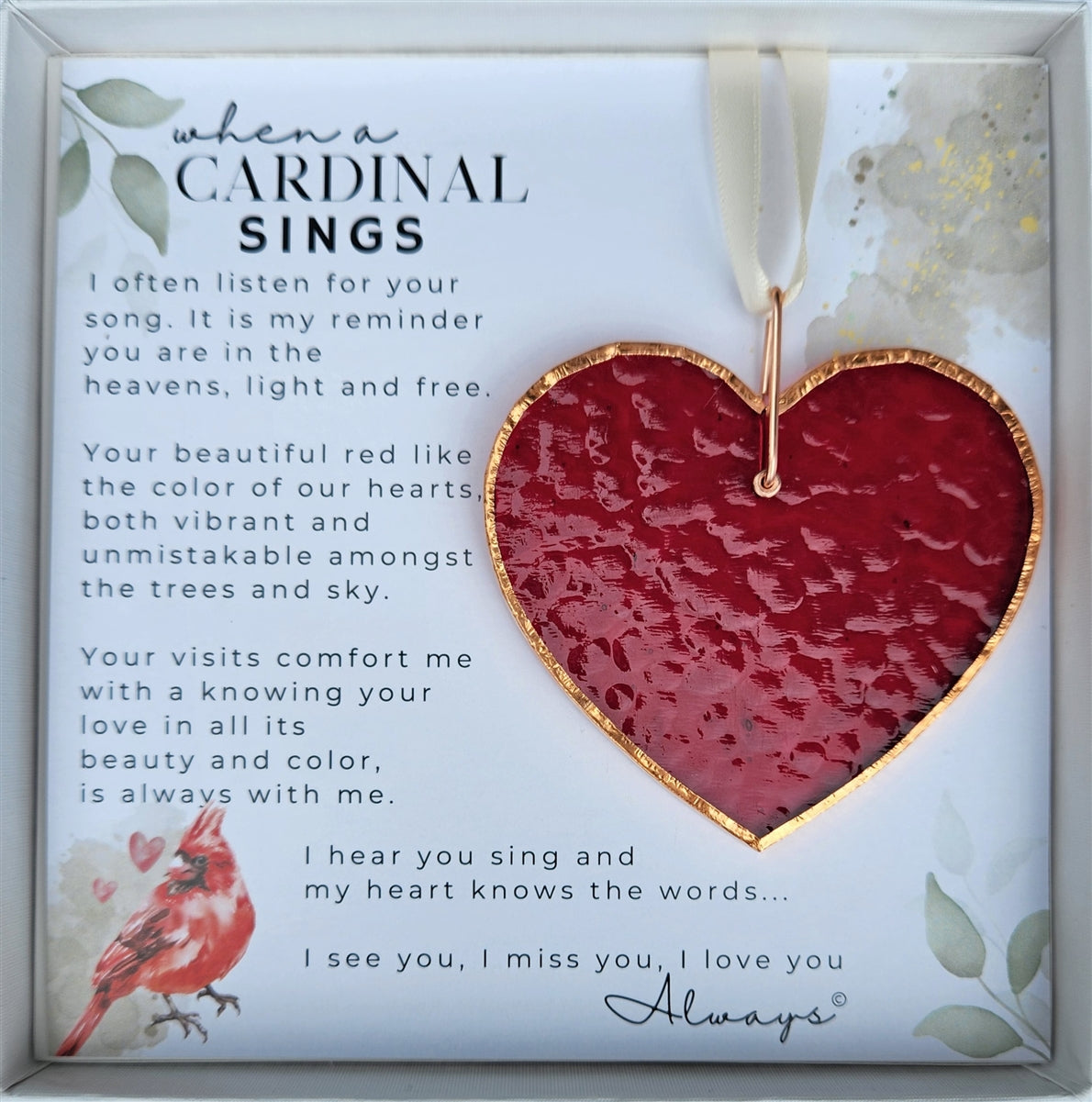 Memorial Gift: Red stained glass heart with copper edging and ring packaged with "When a Cardinal Sings" Poem in a white box with a clear lid.