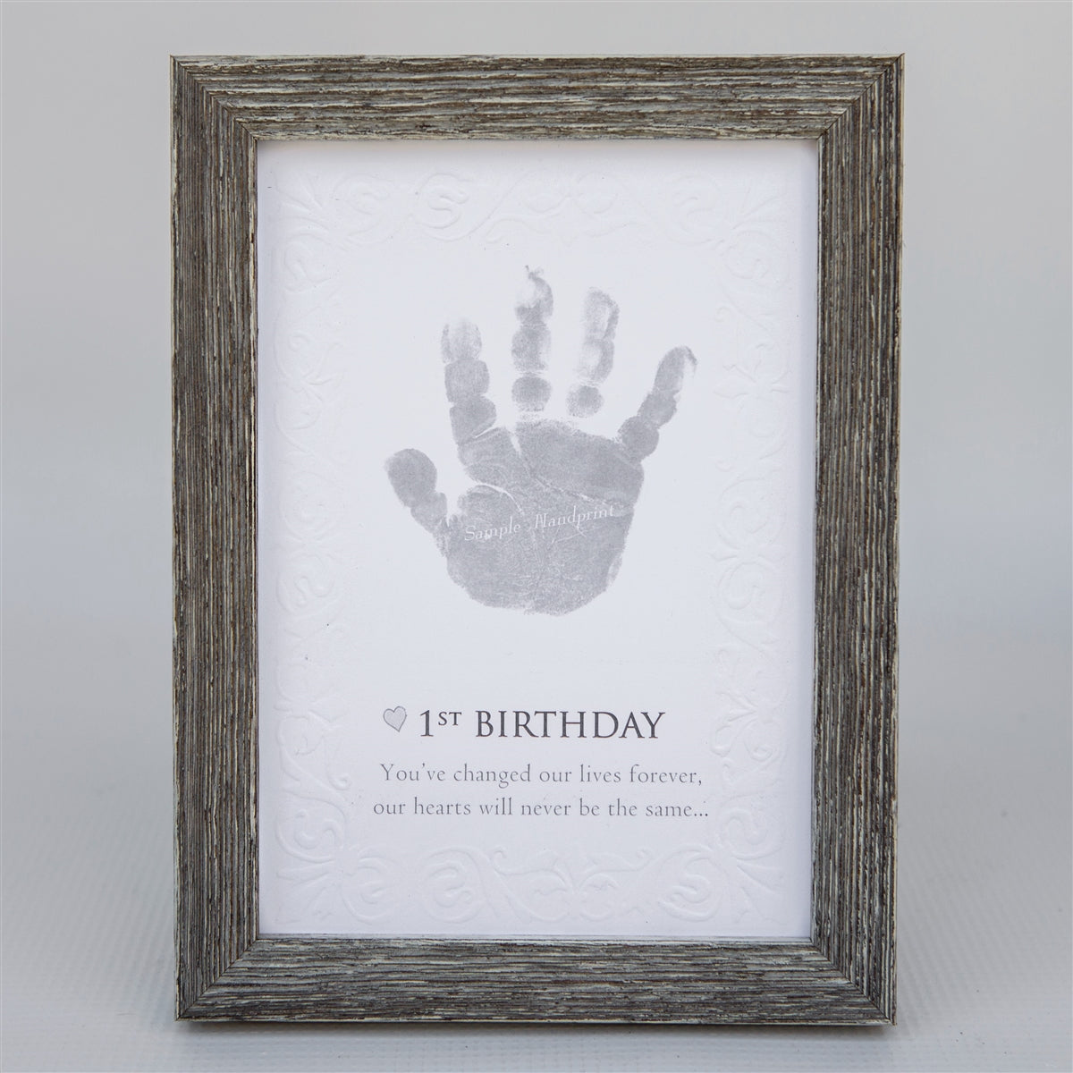 5x7 farmhouse frame with &quot;1st Birthday&quot; sentiment on embossed cardstock with space for a child&#39;s handprint.