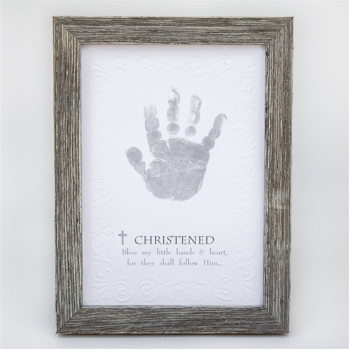 5x7 farmhouse frame with "Christened" Sentiment on embossed cardstock with space for a child's handprint.