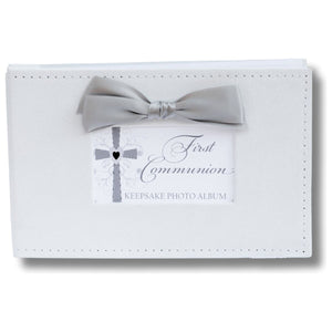 1 of 6:White faux suede keepsake First Communion photo album with gray satin bow.