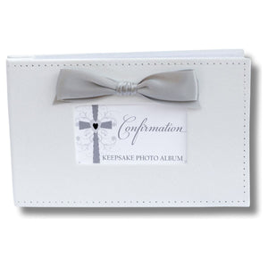 1 of 6:White faux suede keepsake Confirmation photo album with gray satin bow.