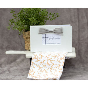 6 of 6:Confirmation photo book in a decorative setting.