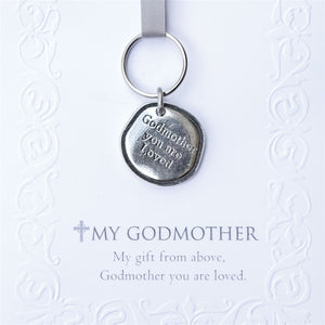 3 of 3:Detailed view of My Godmother coin and sentiment.