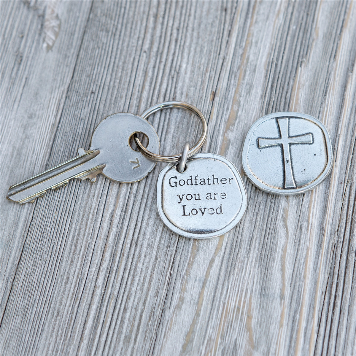 Pewter coin keychain with &quot;Godfather you are Loved&quot; on front and cross on the back.