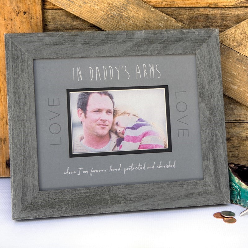 8x10 distressed gray wood frame with gray &quot;In Daddy&#39;s Arms&quot; artwork, black inner mat, and an opening for a photograph.