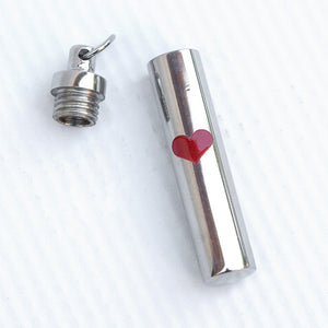 3 of 5:Stainless steel ash/keepsake vial.