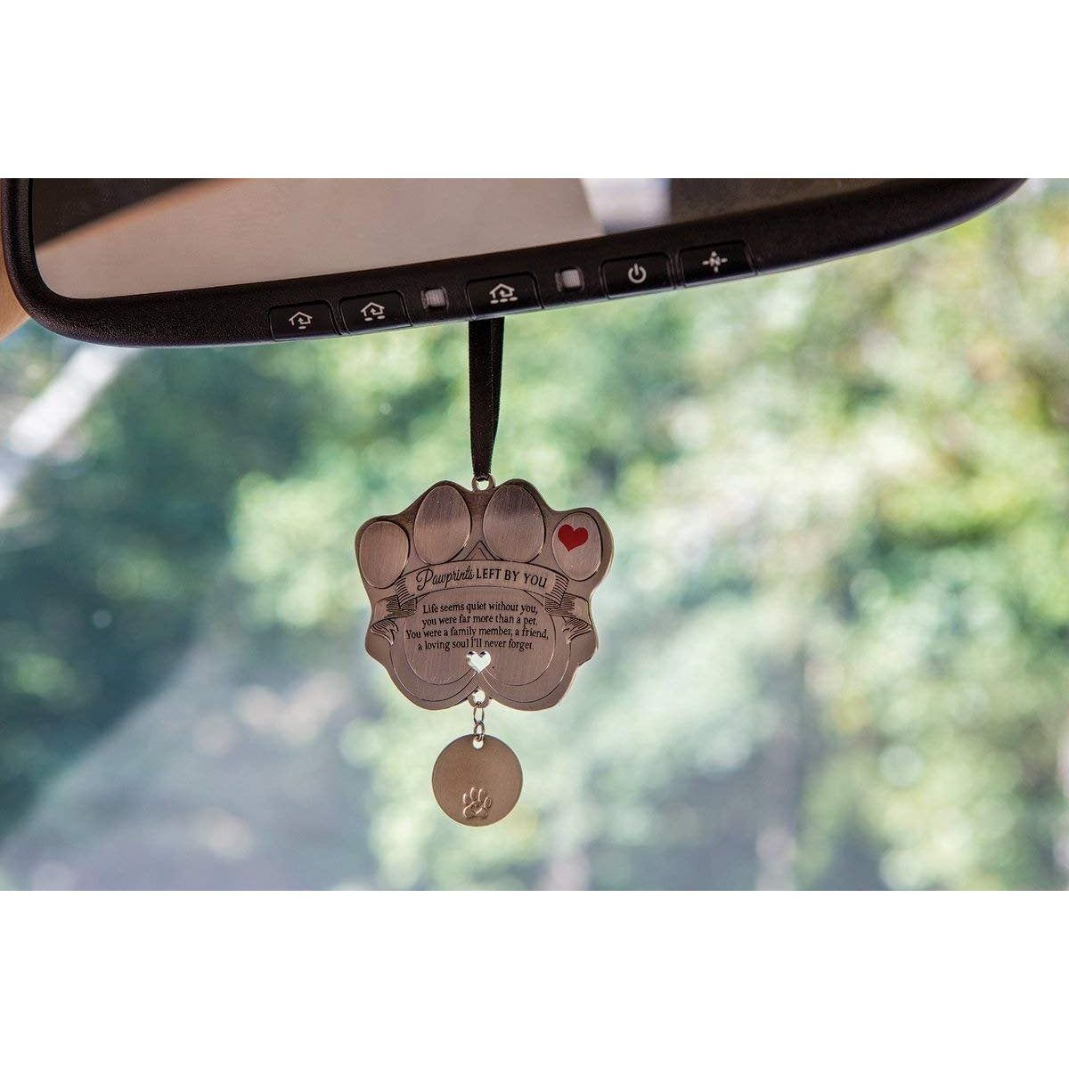 Ornament hanging from rear view mirror.