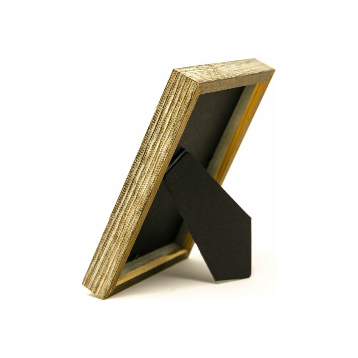 Side view of farmhouse wood frame showing wood grain and easel back.