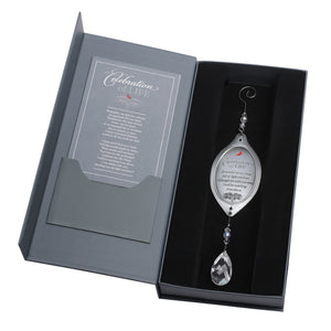 2 of 6:Celebration of Life ornament in gray box with black flocked cushioning and a Celebration of Life sentiment gift card.  Box closes with magnetic closure.
