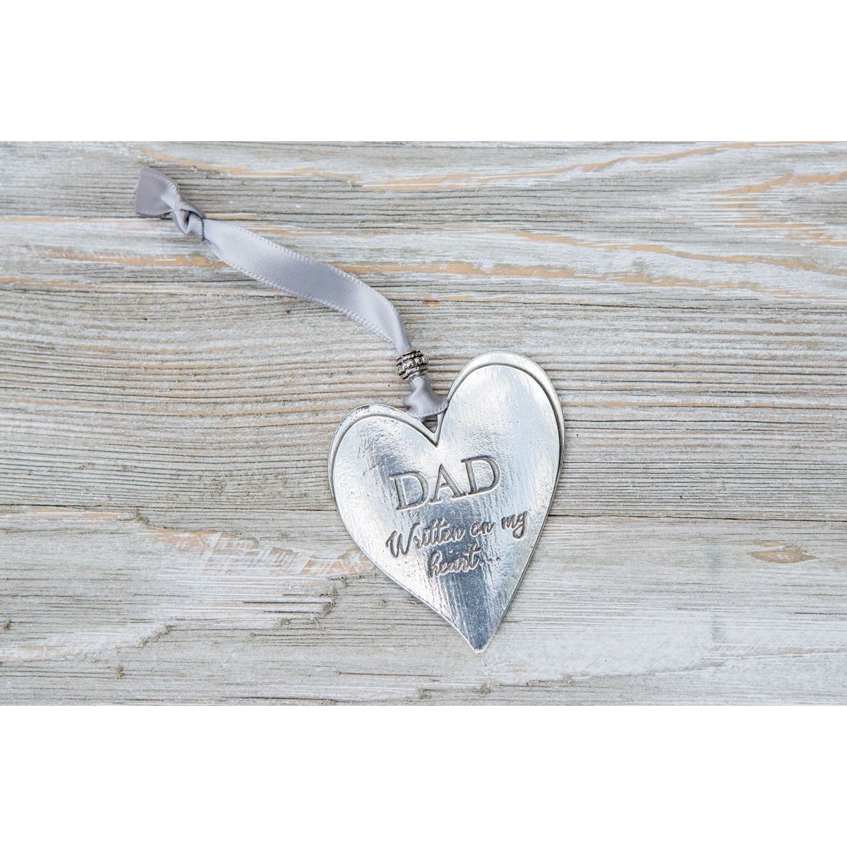 Pewter heart with gray satin for hanging.