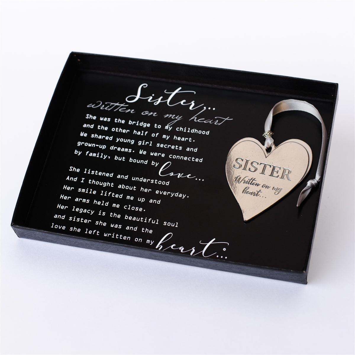 "Sister...Written on My Heart" poem and pewter ornament in a 5x7 box with a clear lid.