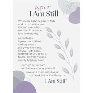 2 of 5:I am Still sentiment with artwork in shades of gray and purple