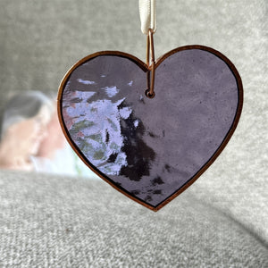 4 of 5:Periwinkle heart with light shining through