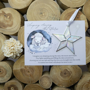 4 of 7:Clear iridescent star with white ribbon and Sleeping Among the Stars poem.