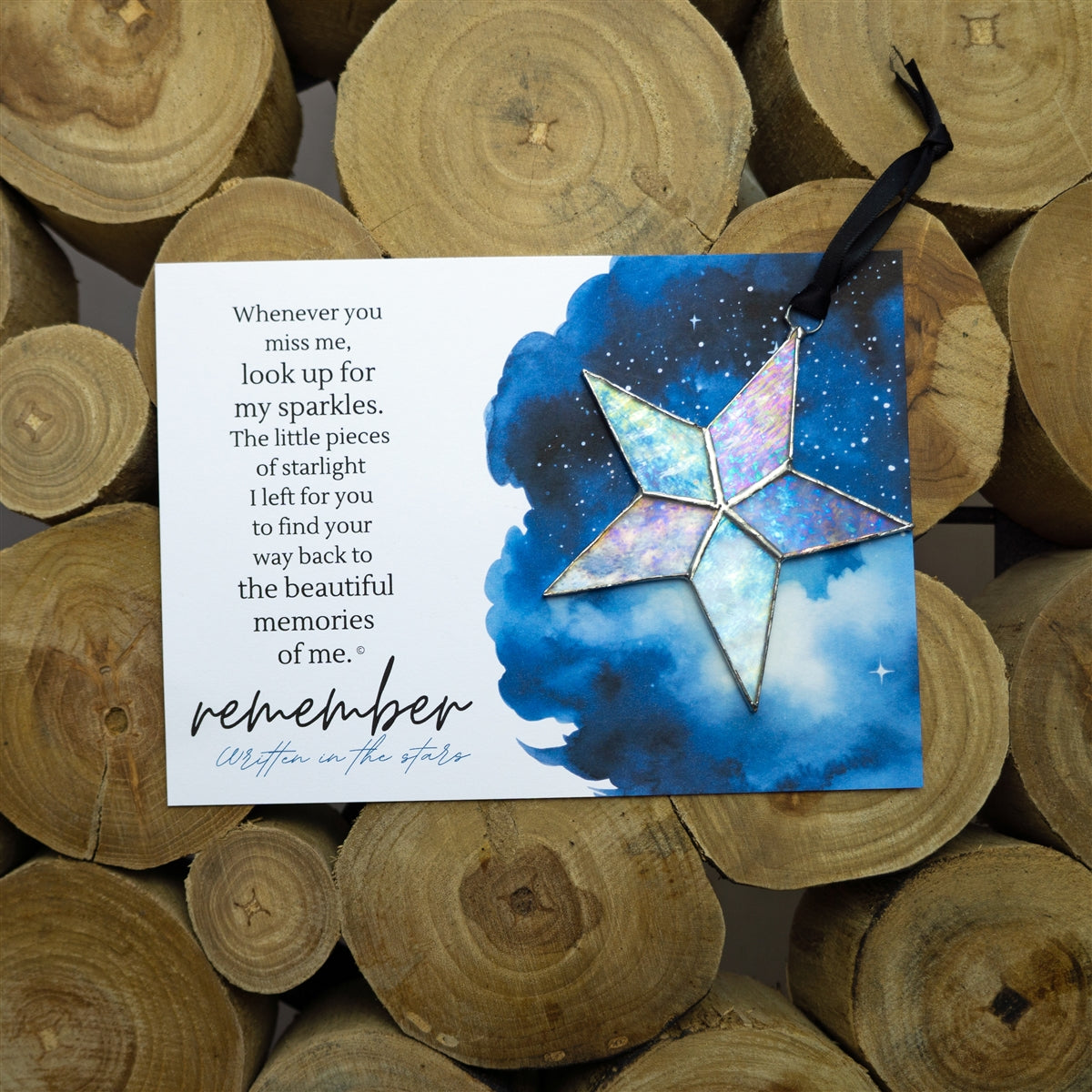 Clear iridescent star and artwork with the "Remember" sentiment.