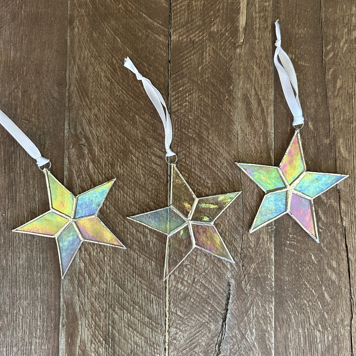 An assortment of glass stars each one unique.