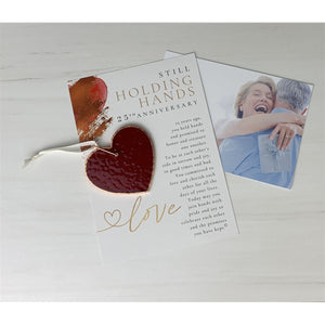 5 of 7:25th Wedding Anniversary gift with photo of a happy couple in background.