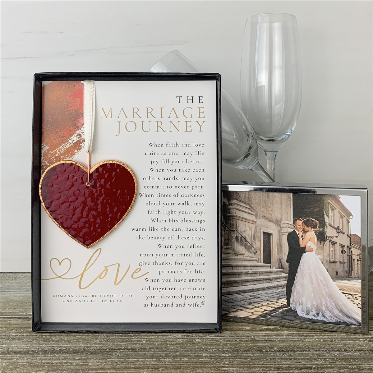 The Marriage Journey gift box standing up in a wedding setting.