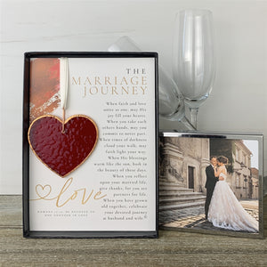 4 of 7:The Marriage Journey gift box standing up in a wedding setting.